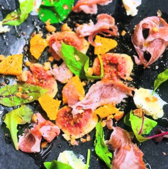 Fig, orange, chestnut pork prosciutto, and cream cheese caprese
