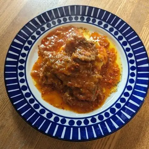 Tuna cheek meat stewed in tomato sauce