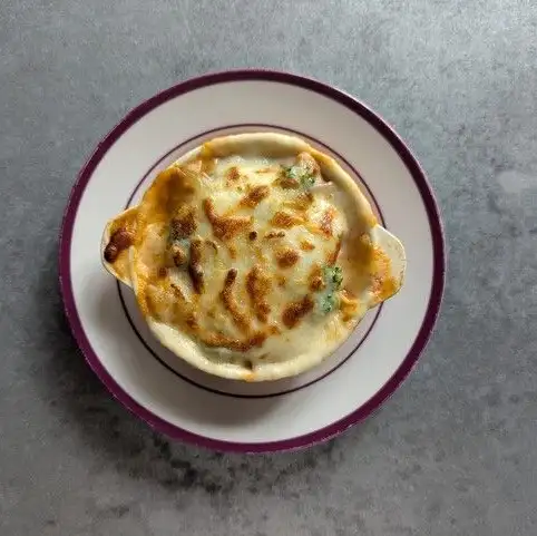 Small cream gratin with colorful vegetables