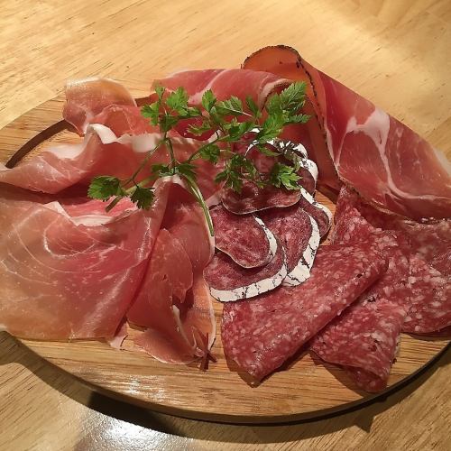 Assorted raw ham and salami