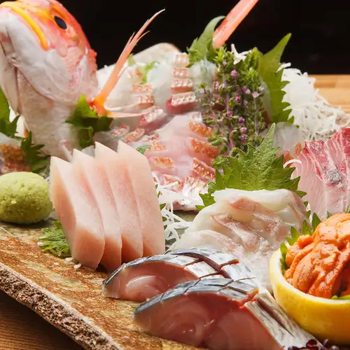 Premium sashimi made with fresh fish delivered directly from the market and prepared with expert craftsmanship.