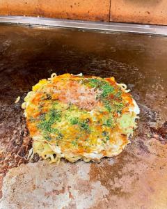 Okonomiyaki with squid and soba noodles