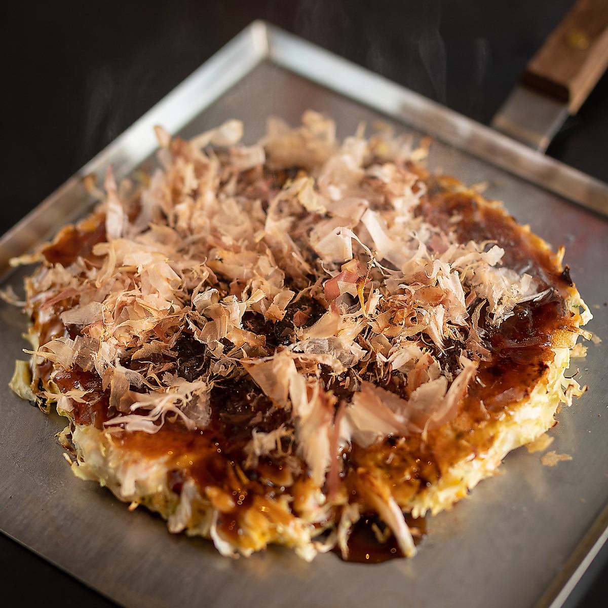 We offer hot ♪ Okonomiyaki with a fluffy texture is 715 yen (tax included) ~ ☆