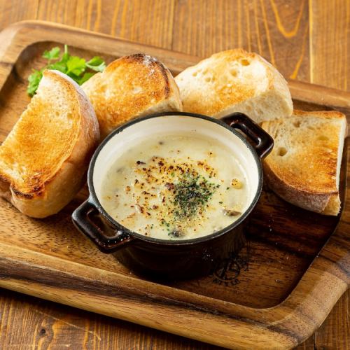 Rich cheese and mushroom cocotte fondue