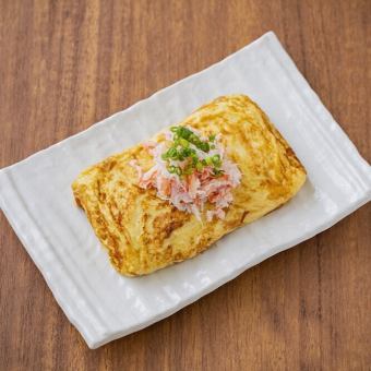 Tamagoyaki (egg roll) with red snow crab