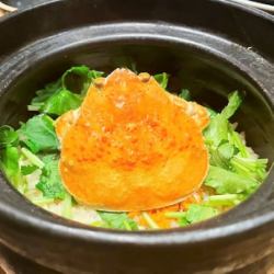 Seko crab rice in a clay pot