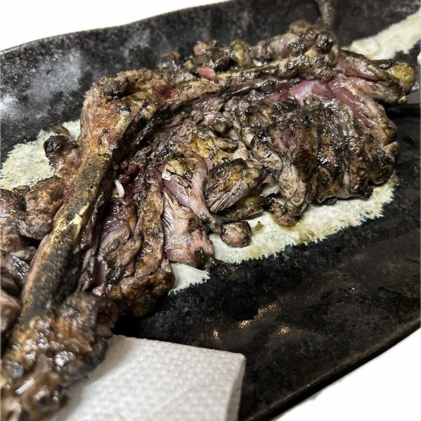 看板メニュー「一本」骨付きもも肉の炭火焼