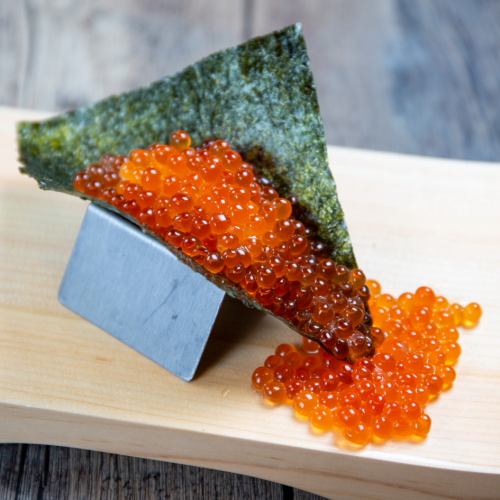 Spilled salmon roe sushi dock