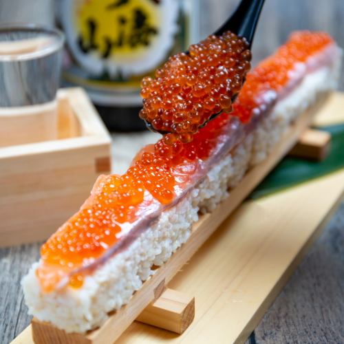 Salmon roe and salmon parent and child long sushi