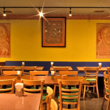 There's a partition so you don't have to worry about the seats behind you. The four-person tables are great for friends, family, coworkers... it's great for a variety of occasions! The restaurant is welcoming to everyone.