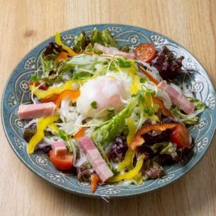 Caesar salad with soft-boiled eggs and bacon