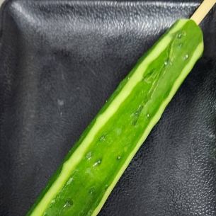 Bite into a whole cucumber