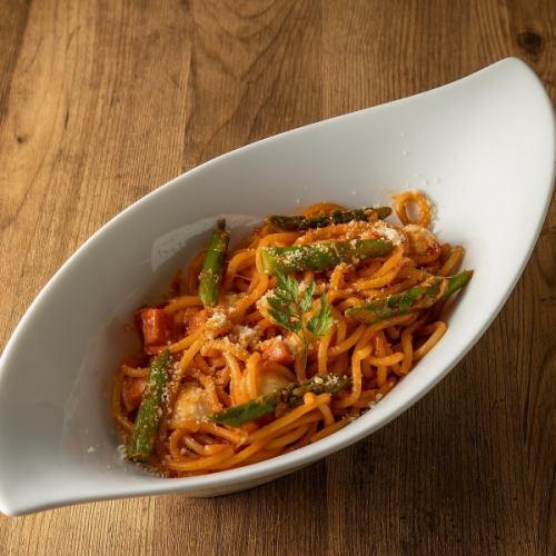 Tomato sauce pasta with mozzarella cheese and asparagus