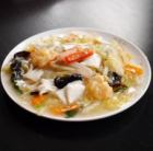 Salty seafood fried noodles with thickened sauce