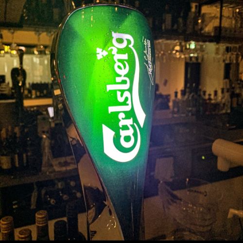The draft beer is Carlsberg! We also have Guinness and Budweiser.
