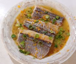 Grilled herring with island shallot sauce