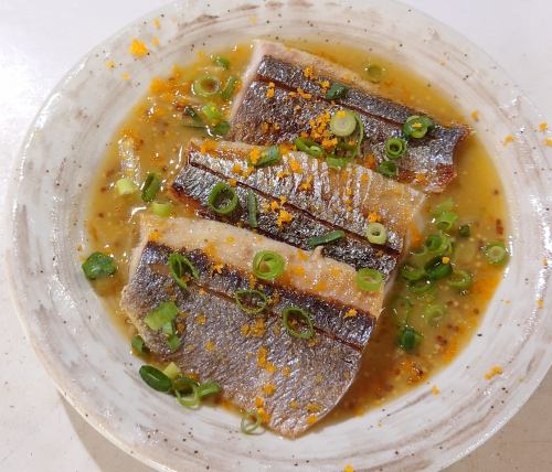 Grilled herring with island shallot sauce
