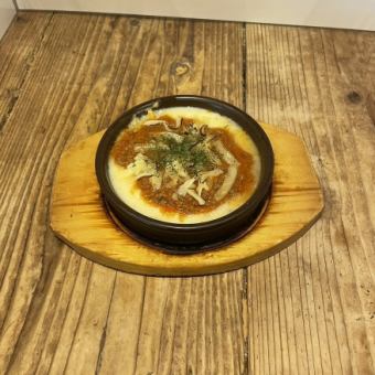 Mashed potatoes baked with Bolognese cheese