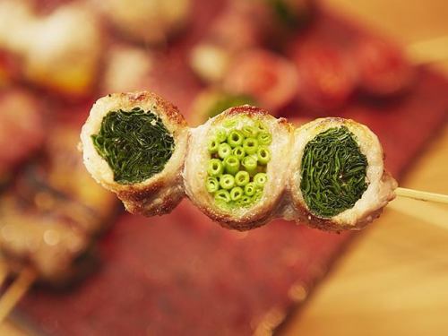 Black pork wrapped in green onions