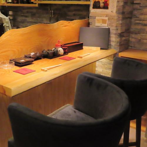 Two-person counter seating. Hidden and extremely popular couple seating.