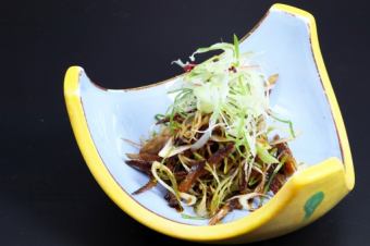 Filleted herring with green onions