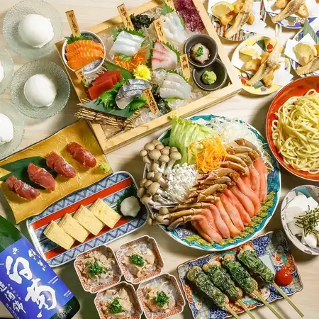 A luxurious 10-course meal including crab shabu-shabu and a lavish sashimi platter, originally priced at 11,000 yen, now available for 10,000 yen.
