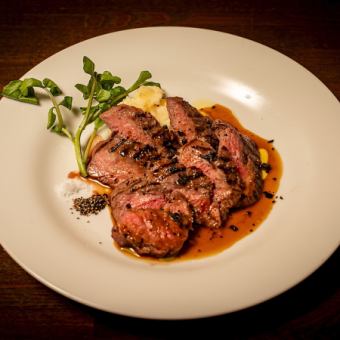 Grilled rare beef spectacles steak with truffle and Marsala wine sauce