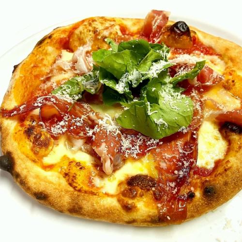 Prosciutto and arugula pizza