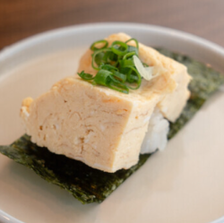 1 piece of rolled egg sushi