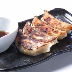 Grilled Black Pork Dumplings