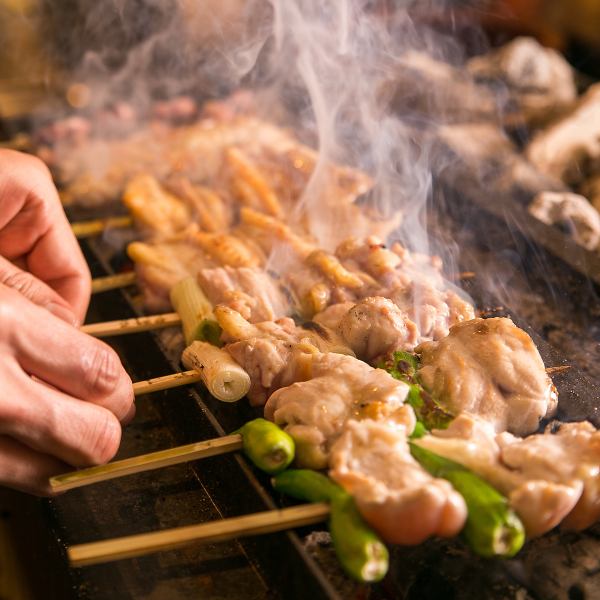 Carefully selected chickens from all over the country are grilled over charcoal .... ♪