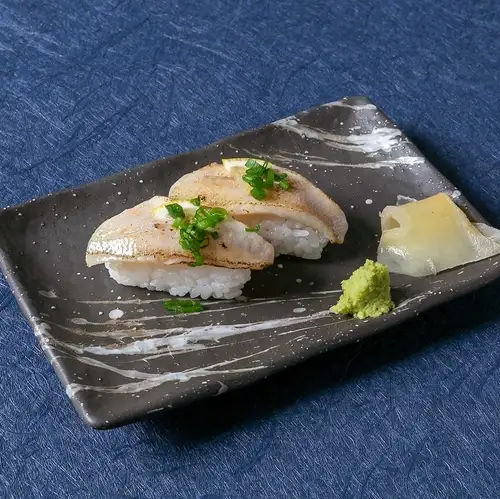 Seared blackthroat seaperch with salt and lemon nigiri