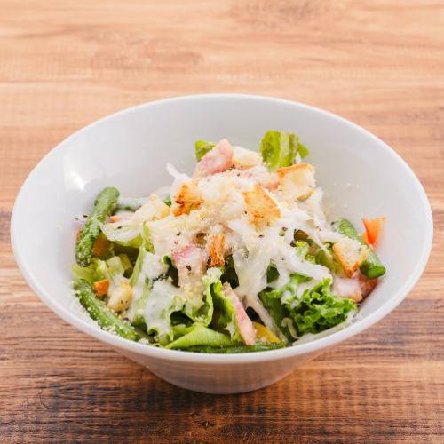 Caesar salad with asparagus and bacon