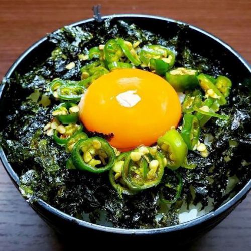 Rice with egg over green soy sauce