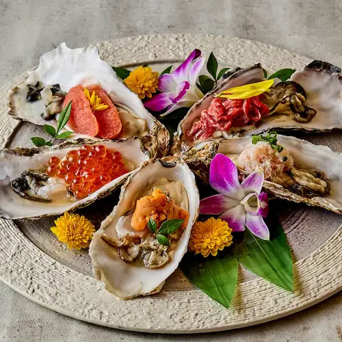Enjoy Hokkaido's seafood and local sake.