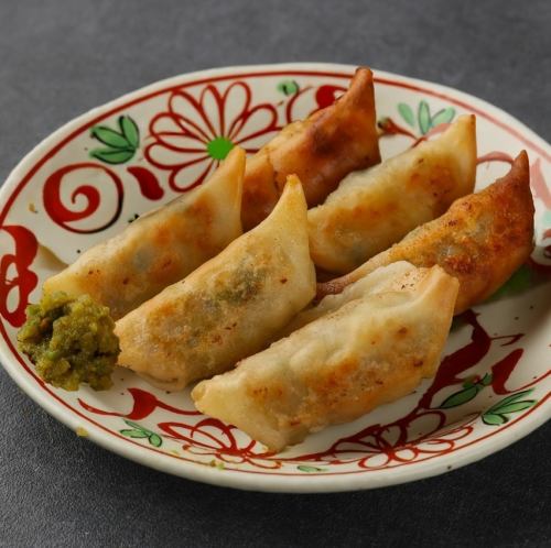 Hakata specialty bite-sized gyoza dumplings with homemade yuzu pepper
