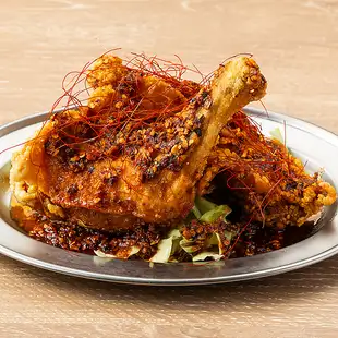 Spicy and delicious! Whole fried chicken thigh with bone in