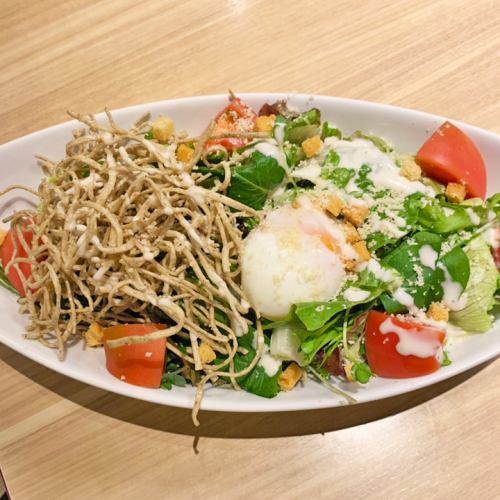 Soft-boiled egg and fried soba Caesar salad