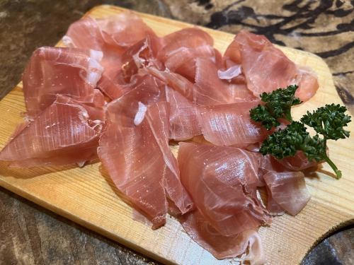 "Freshly cut raw ham"