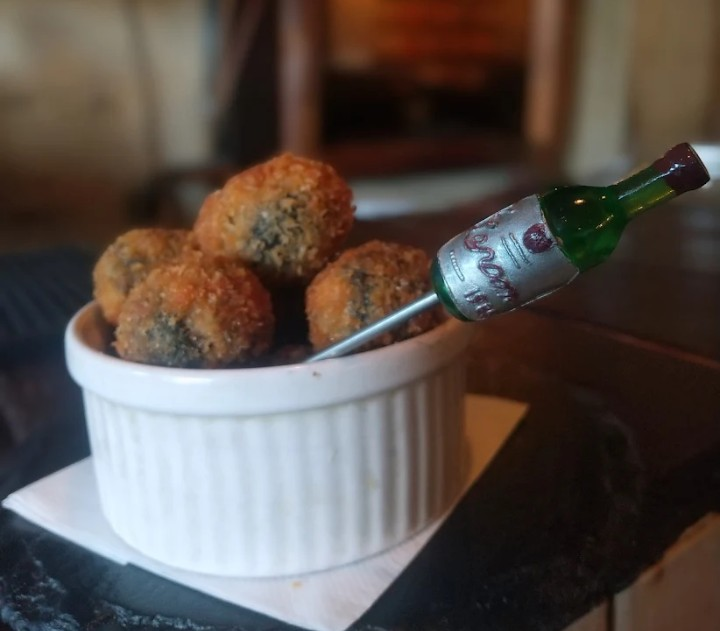 These are the perfect beer snacks, made with ground meat seasoned with herbs, carefully stuffed into each one, coated in batter, and deep-fried!