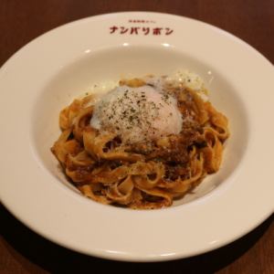 Pork poached egg with beef ragu Bolognese