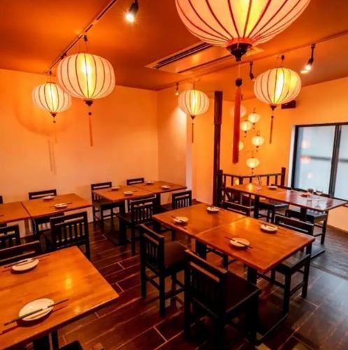 The second floor seats are warmed by Hoi An lanterns.
