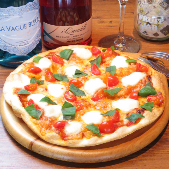 Margherita pizza with mozzarella cheese and basil