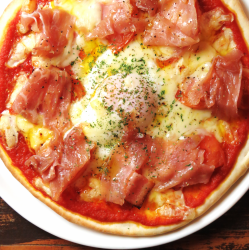 Special pizza with prosciutto and soft-boiled egg