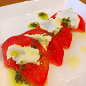 Tomato and cream cheese caprese