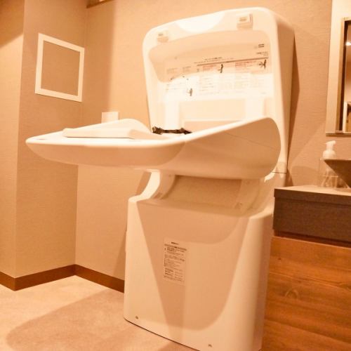 A diaper changing table is available in the dressing room.