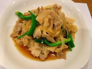 Stir-fried pork with peppers and onions