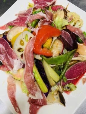 Marinated seasonal vegetables and prosciutto