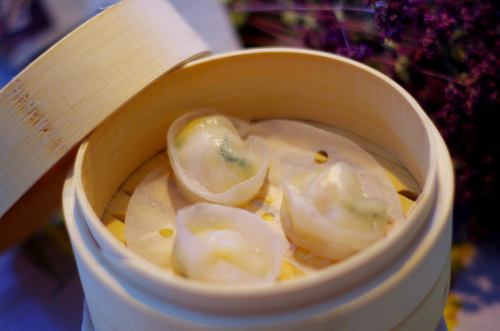 Steamed gyoza with scallops and vegetables