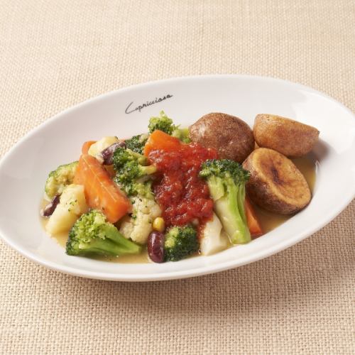 Steamed vegetables with butter and fried potatoes